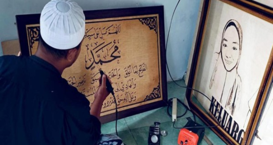 Raup Cuan dari Kaligrafi Lukis Bakar